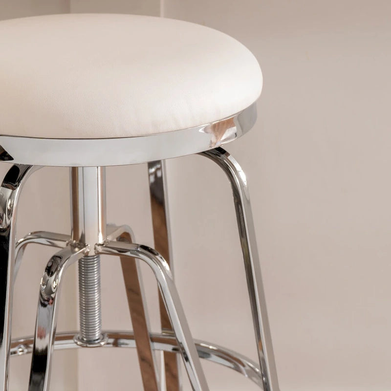 Tabouret sans dossier réglable en métal et similicuir